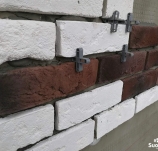 Облицовка дома искусственным камнем